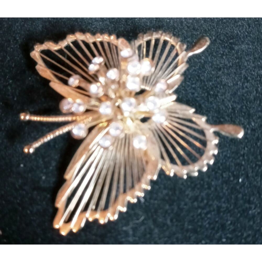 Butterfly Gold tone Clear Rhinestones brooch signed Monet 1 1/2" X 1 1/2"